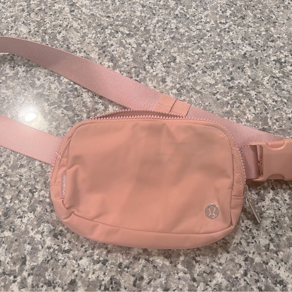 lululemon athletica Handbags - Lululemon belt bag, dusty, rose pink